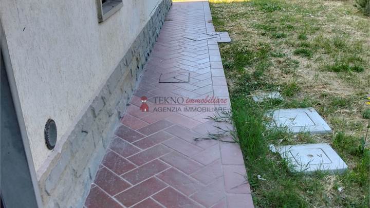 FAELLA BILOCALE CON GARAGE E GIARDINO